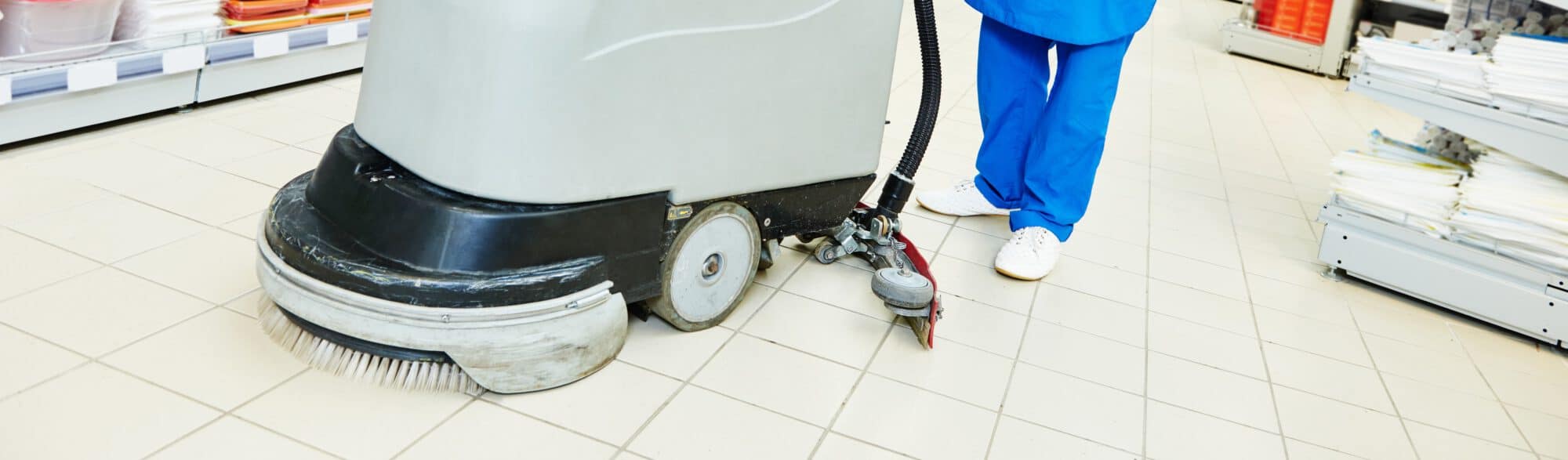 Floor cleaning services with washing machine in supermarket shop store